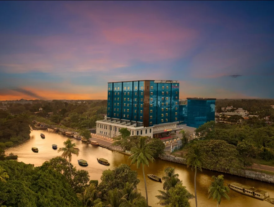 Exterior facade and entrance of Olivia International Hotel in Alleppey