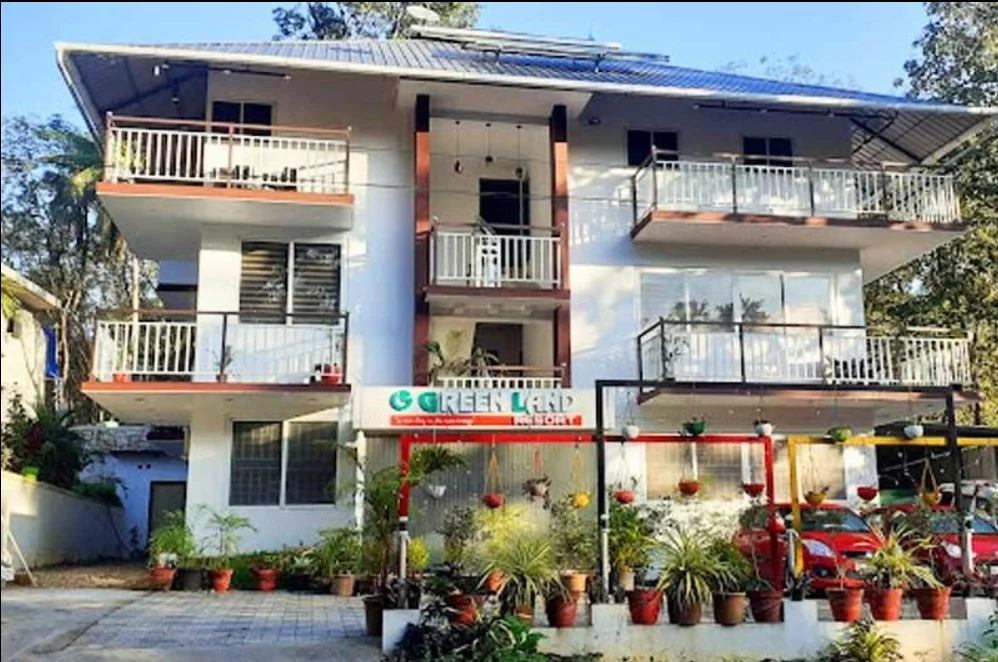 Exterior facade and entrance of Athirapilly Green Land Resort in Athirapally