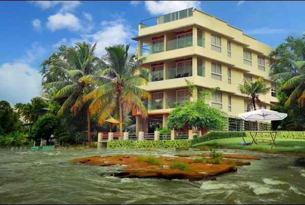 Riverine Suites Resort exterior facade in Athirapally