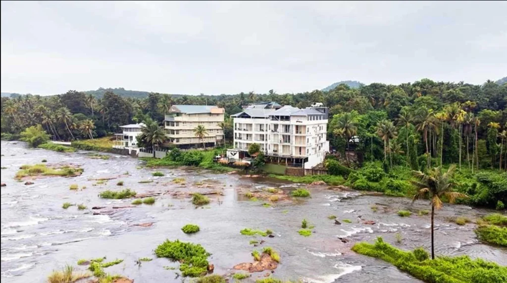 Exterior facade and entrance of The Anchorage Athirapilly Resort in Athirapally