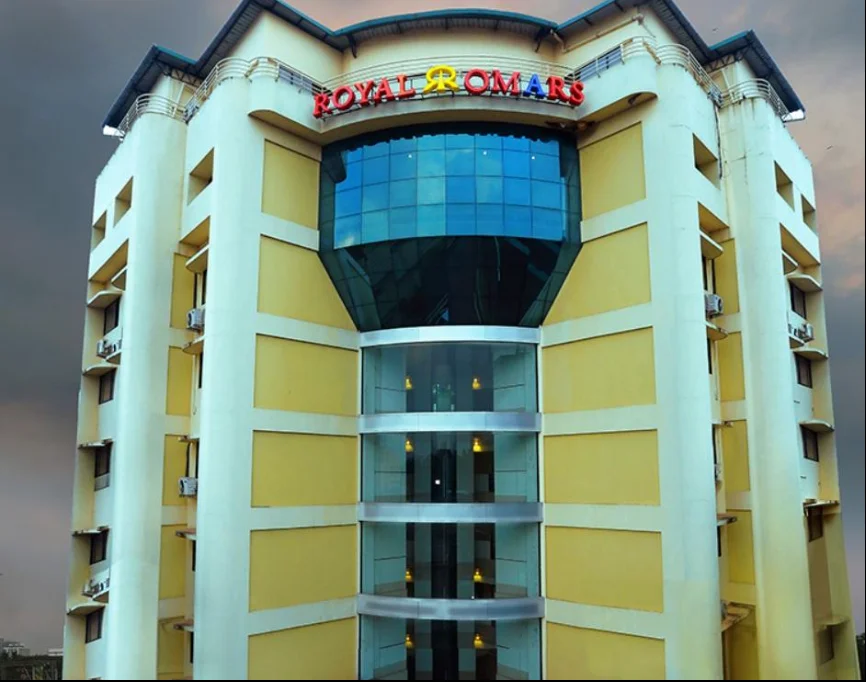 Exterior facade and entrance of Hotel Royal Omars in Kannur