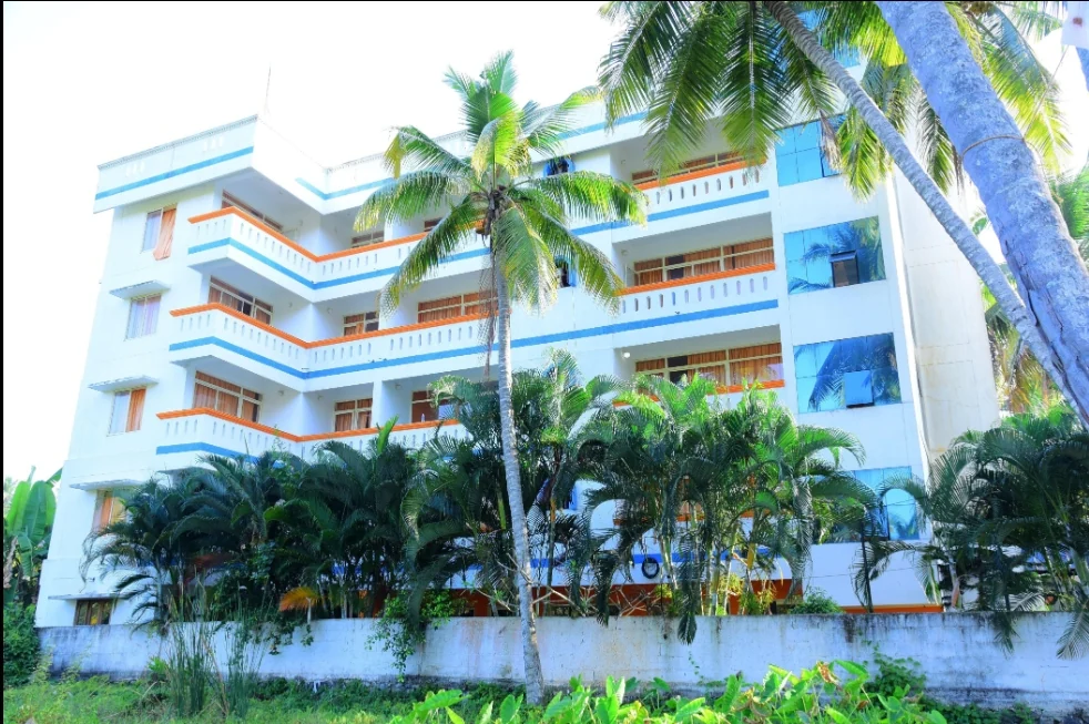 Exterior facade and entrance of Ocean Bay Ayurvedic Beach Resort in Kovalam