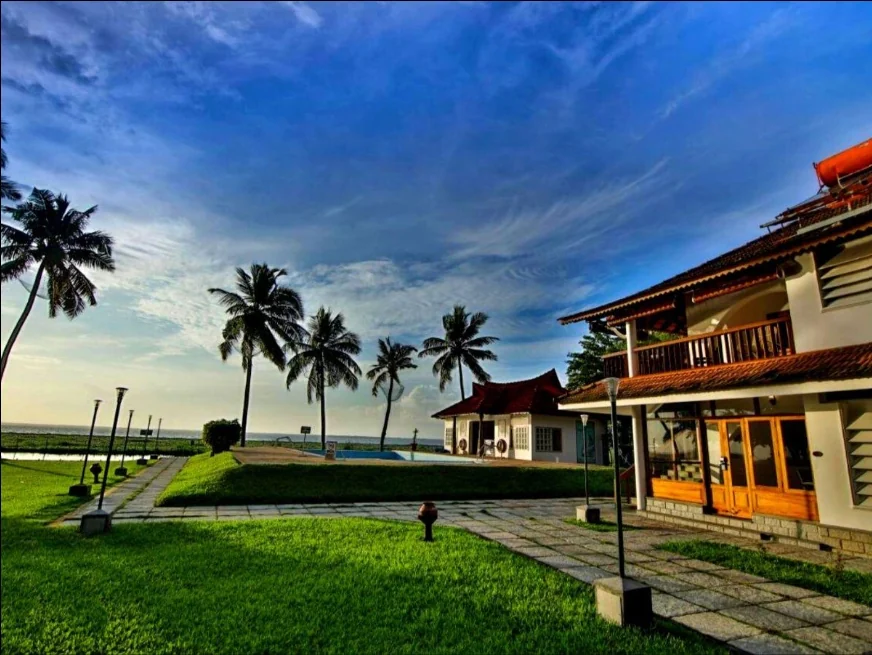 Exterior facade and entrance of Backwater Ripples in Kumarakom