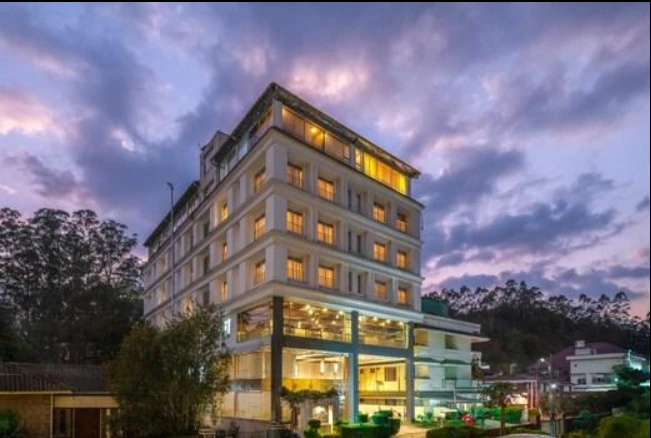 Exterior facade and entrance of Grand Plaza in Munnar