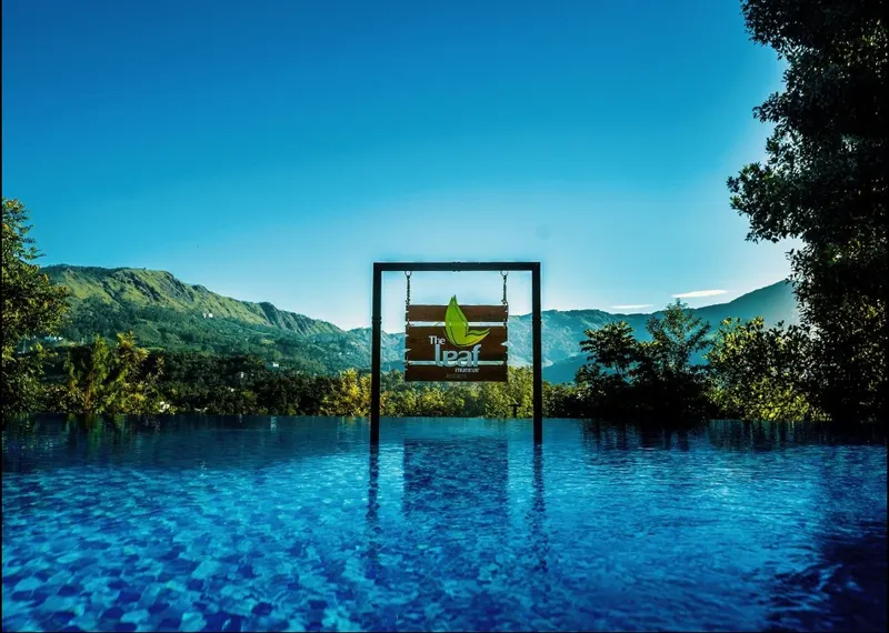 The Leaf Munnar pool deck and blue waters