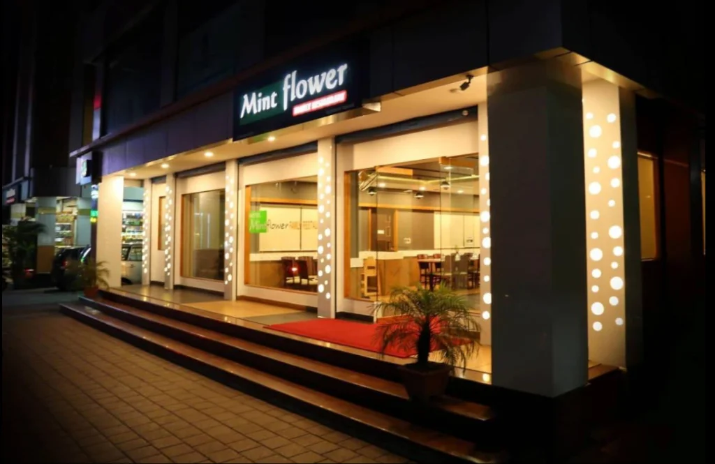 Exterior facade and entrance of Hotel Mint Flower in Wayanad