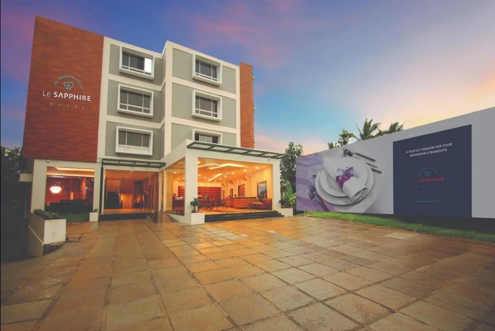 Exterior facade and entrance of La Sapphire Hotel Sulthan Bathery in Wayanad