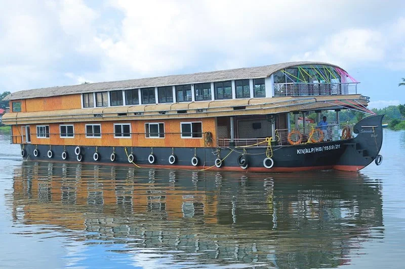 Samudra Royal double-decker luxury flagship houseboat cruising on backwaters with registration KIV/ALP/HB/1559/21